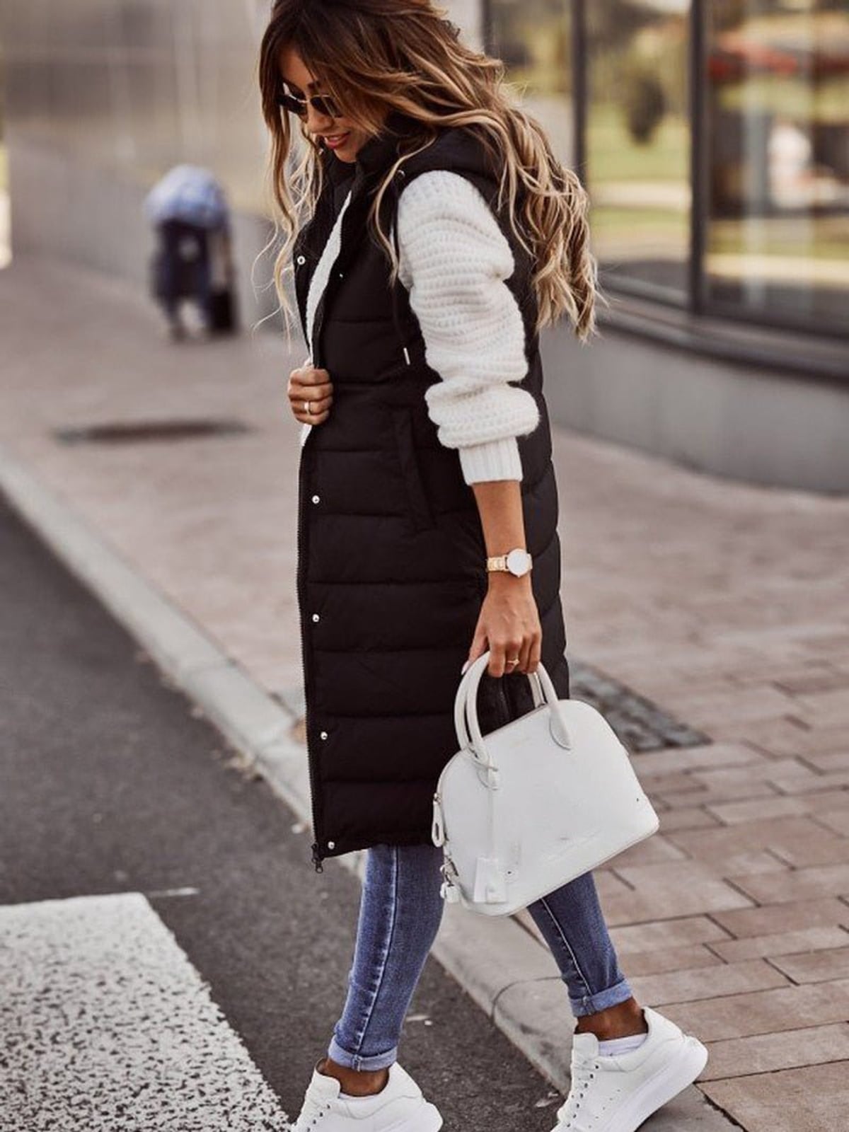 women's long quilted hooded gilet in black