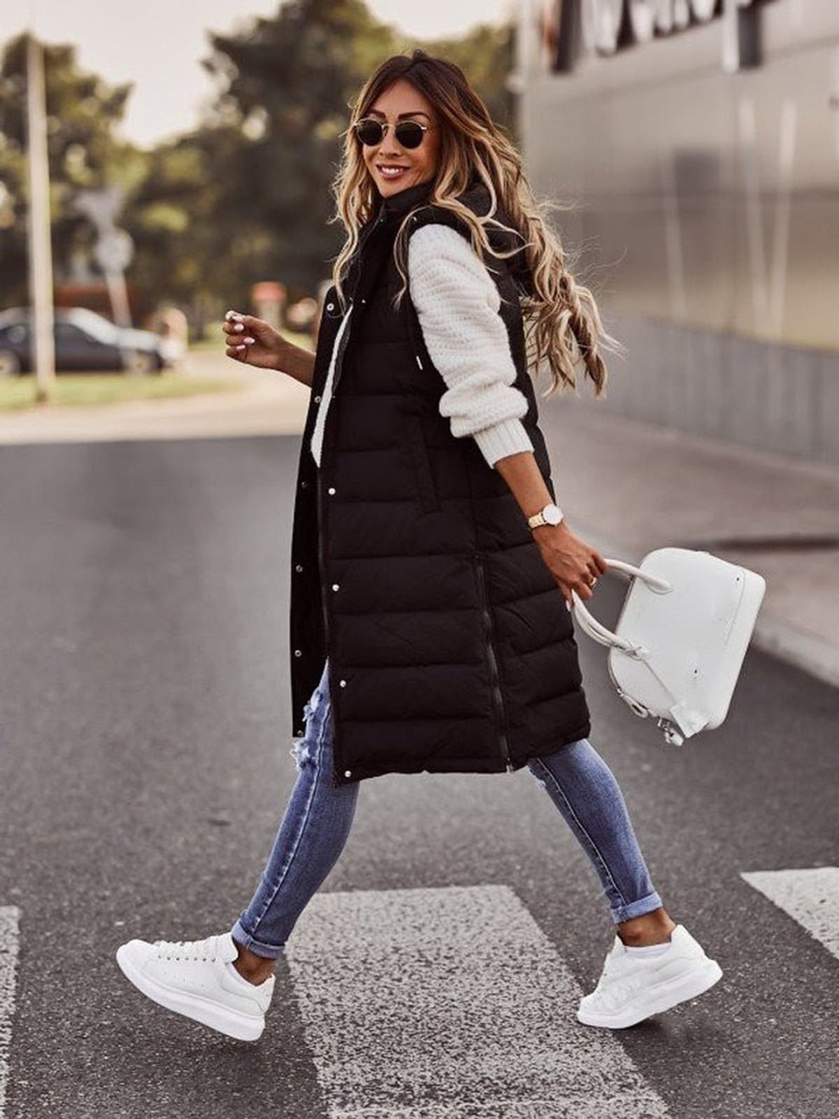women's long quilted hooded gilet in black