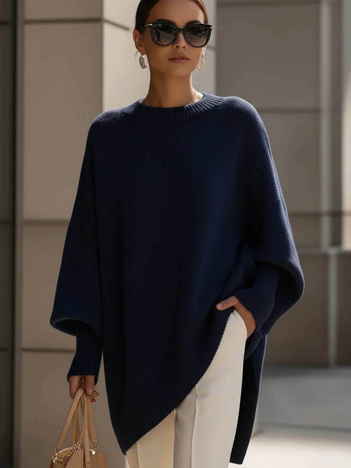 women's oversized batwing poncho sweater in navy blue