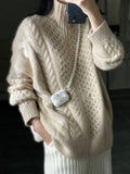 women's oversized cable knit zip-up sweater in ecru
