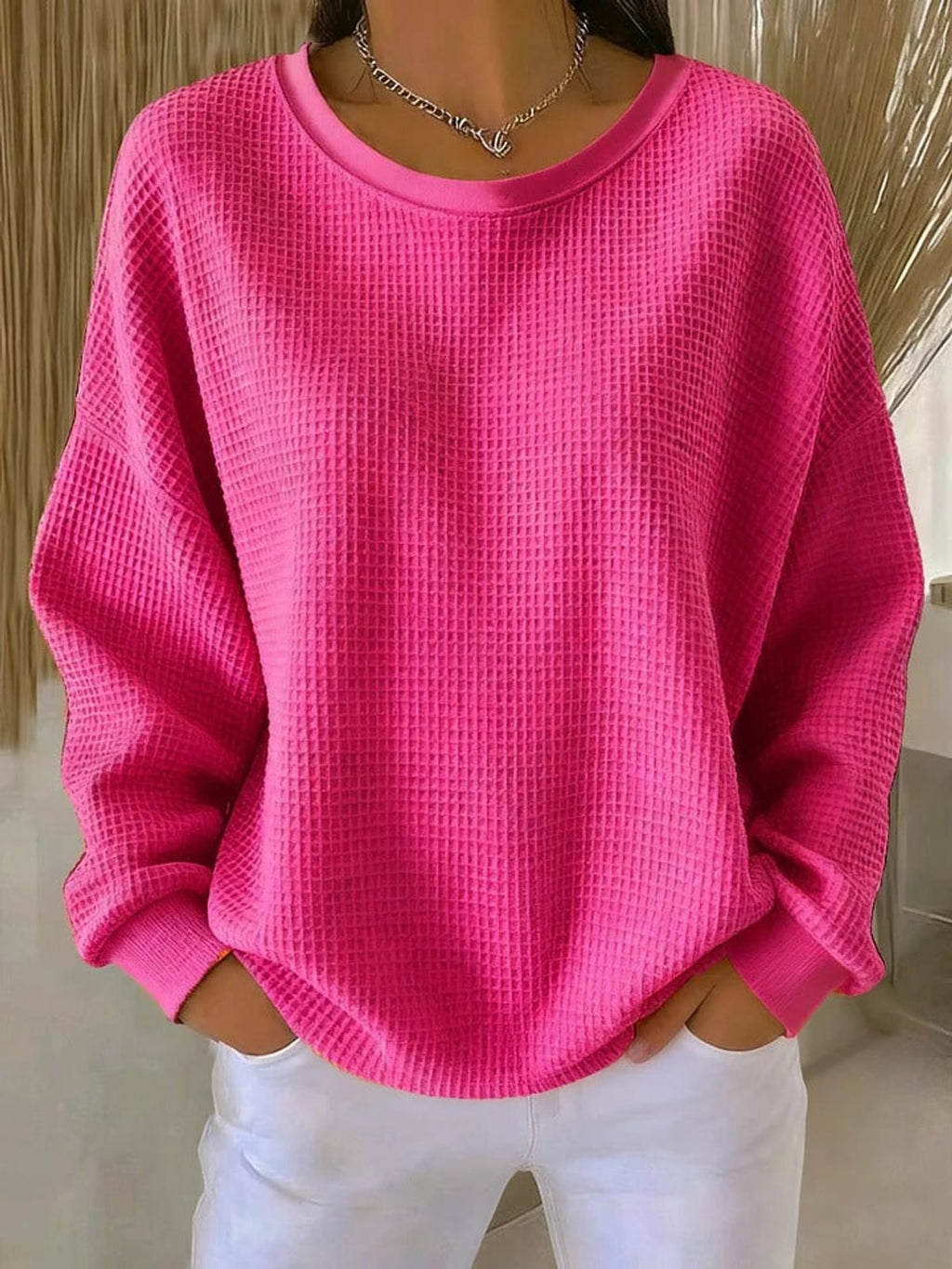 women's oversized pullover crew neck sweater in bright pink