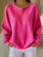 women's oversized pullover crew neck sweater in bright pink