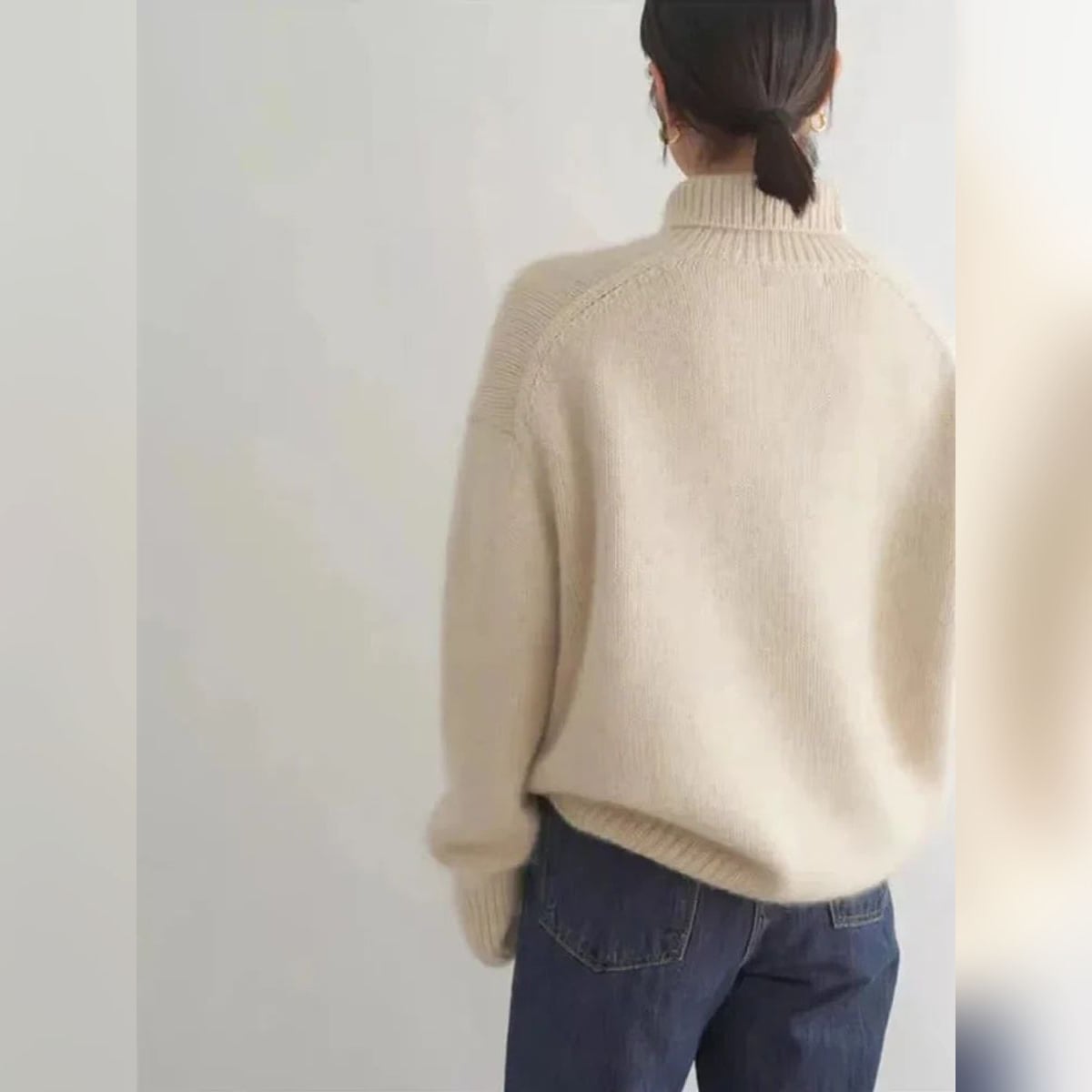 women's oversized pullover turtleneck sweater in apricot