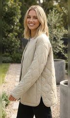 women's oversized quilted jacket in beige