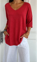 women's oversized v-neck knit top in red