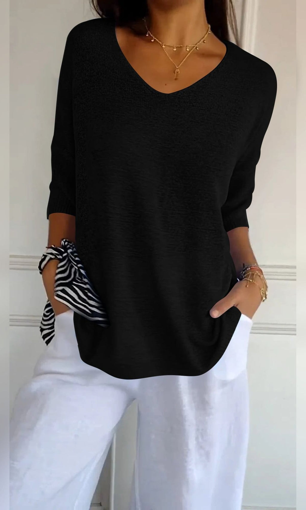 women's oversized v-neck knit top in black