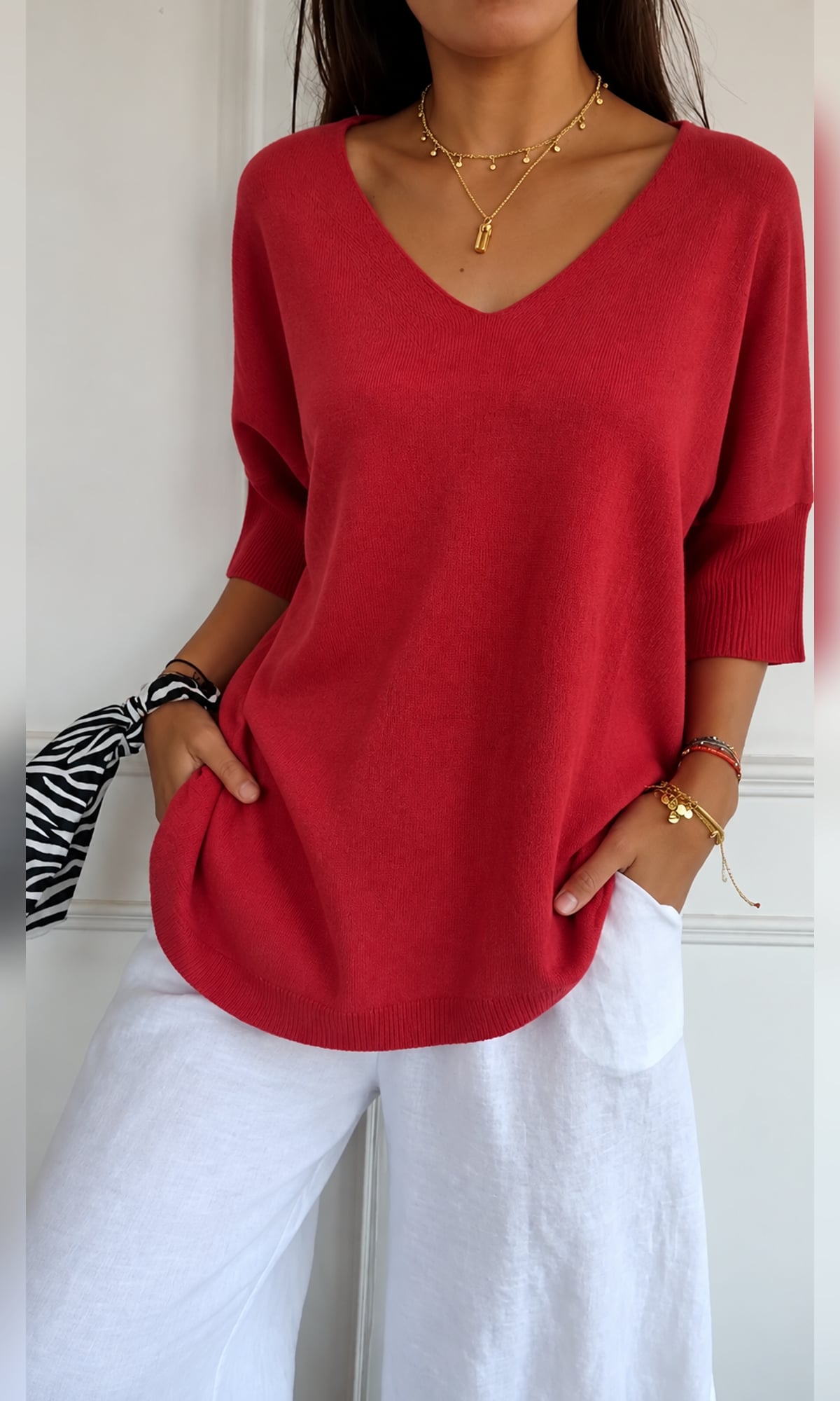 women's oversized v-neck knit top in red