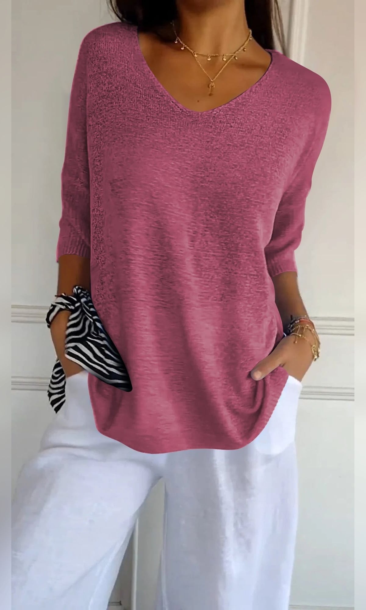 women's oversized v-neck knit top in pink