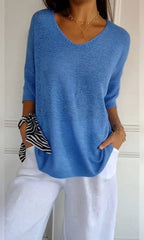 women's oversized v-neck knit top in blue