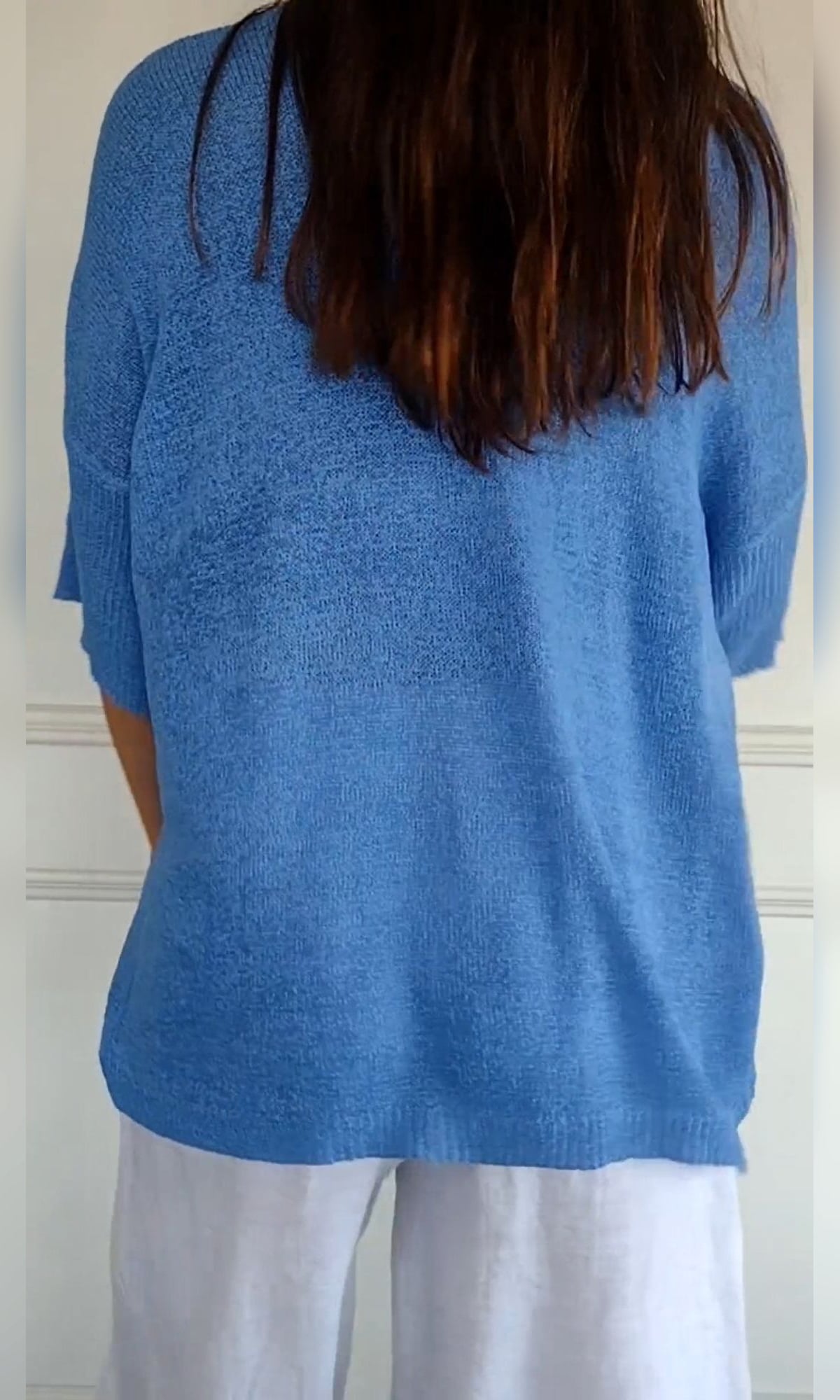 women's oversized v-neck knit top in blue