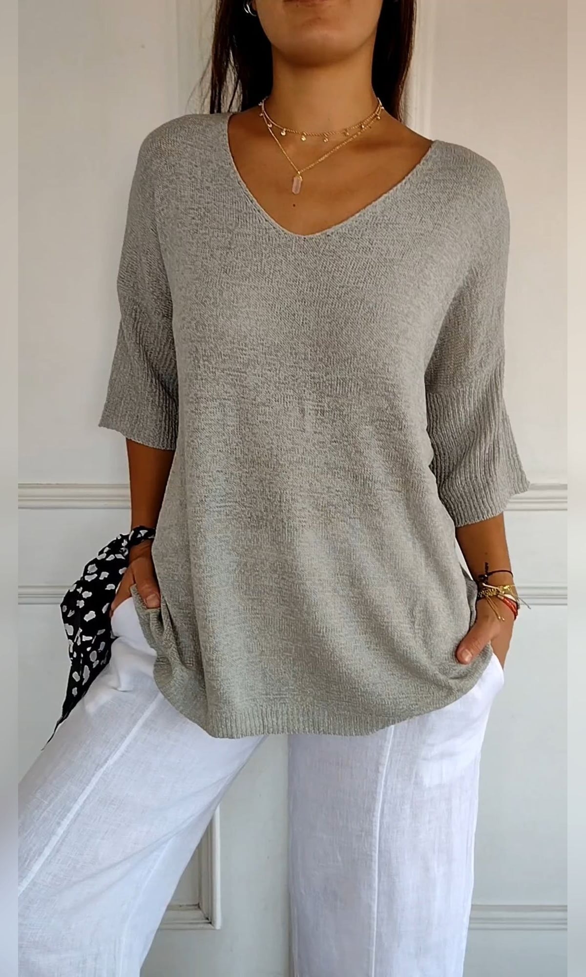 women's oversized v-neck knit top in gray