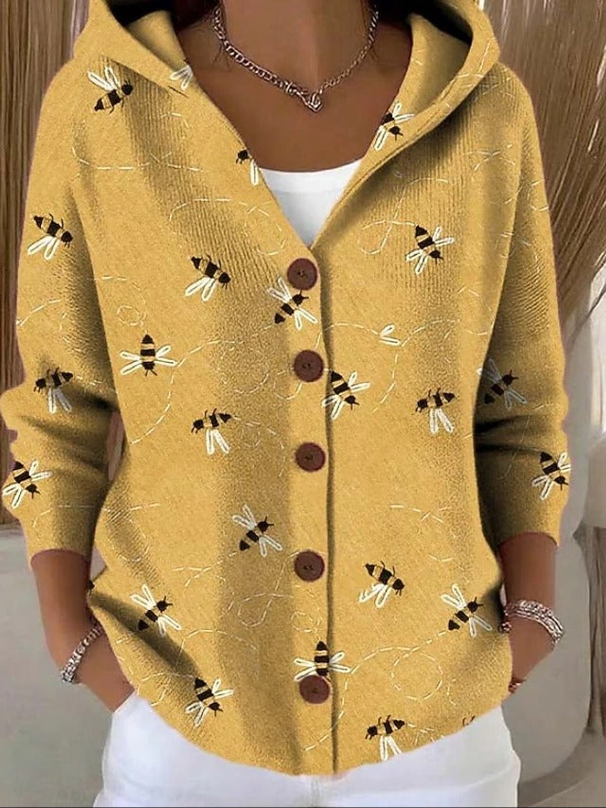 women's printed button-up hooded cardigan sweater in yellow