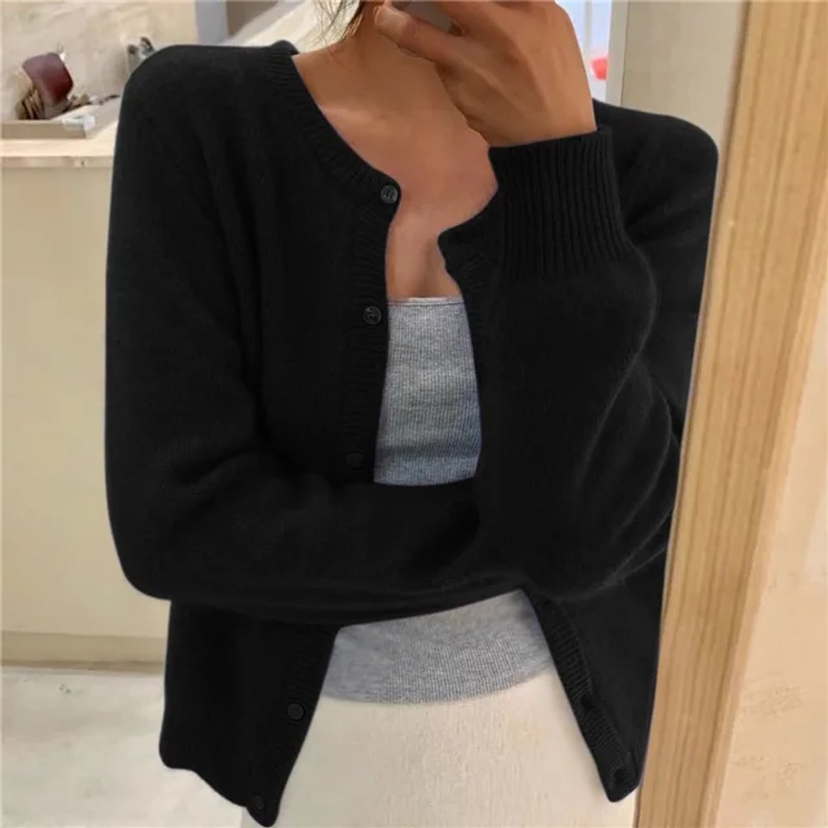 women's relaxed fit button-up cardigan sweater in black
