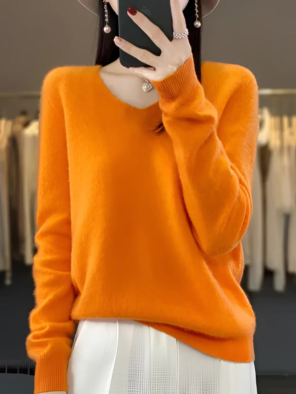 women's relaxed fit v-neck pullover sweater in orange