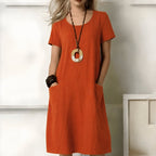 women's short sleeve relaxed midi dress with pockets in orange