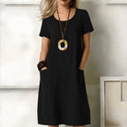 women's short sleeve relaxed midi dress with pockets in black