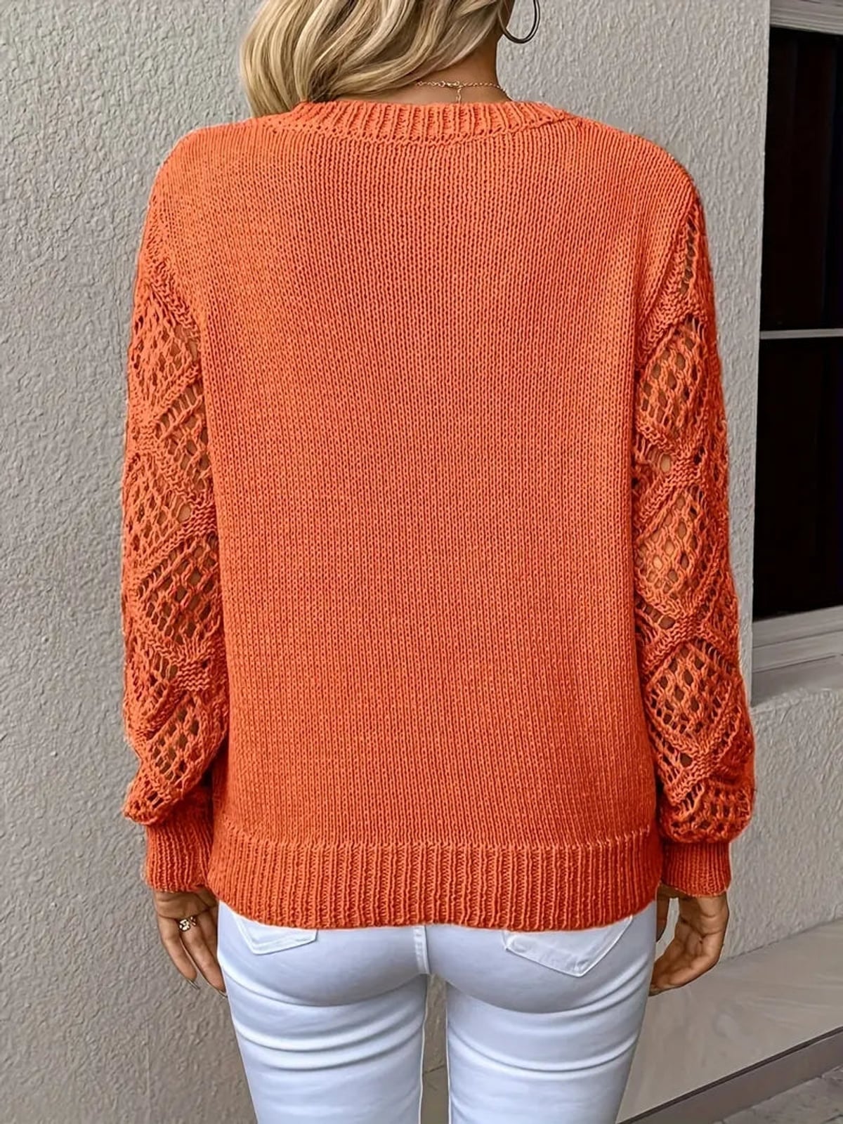 women's v-neck openwork sleeve knit sweater in orange