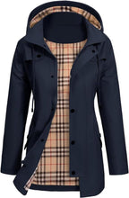 women's waterproof hooded jacket with fitted waist in dark blue