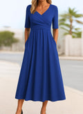 women's wrap front midi dress with pockets in navy blue